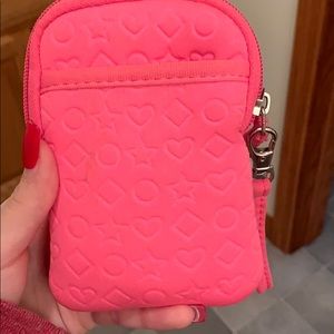 pink wallet with shapes
